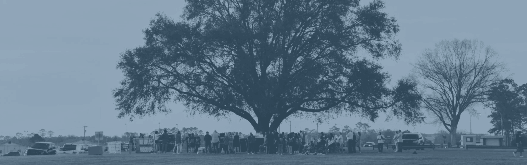 Protestors gather outside of Florida State Prison during an execution vigil.